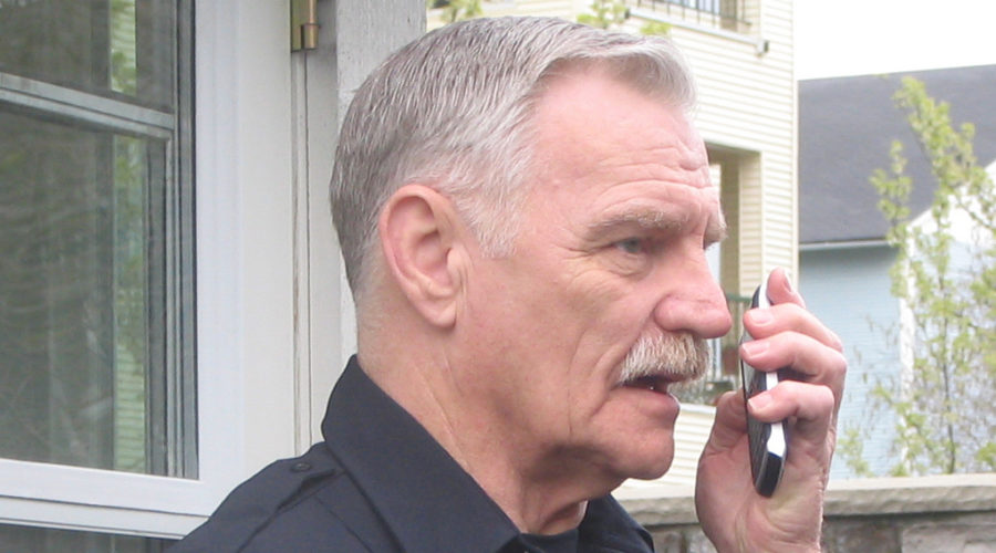 Security officer talking on phone