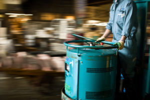 Worker in food safety facility